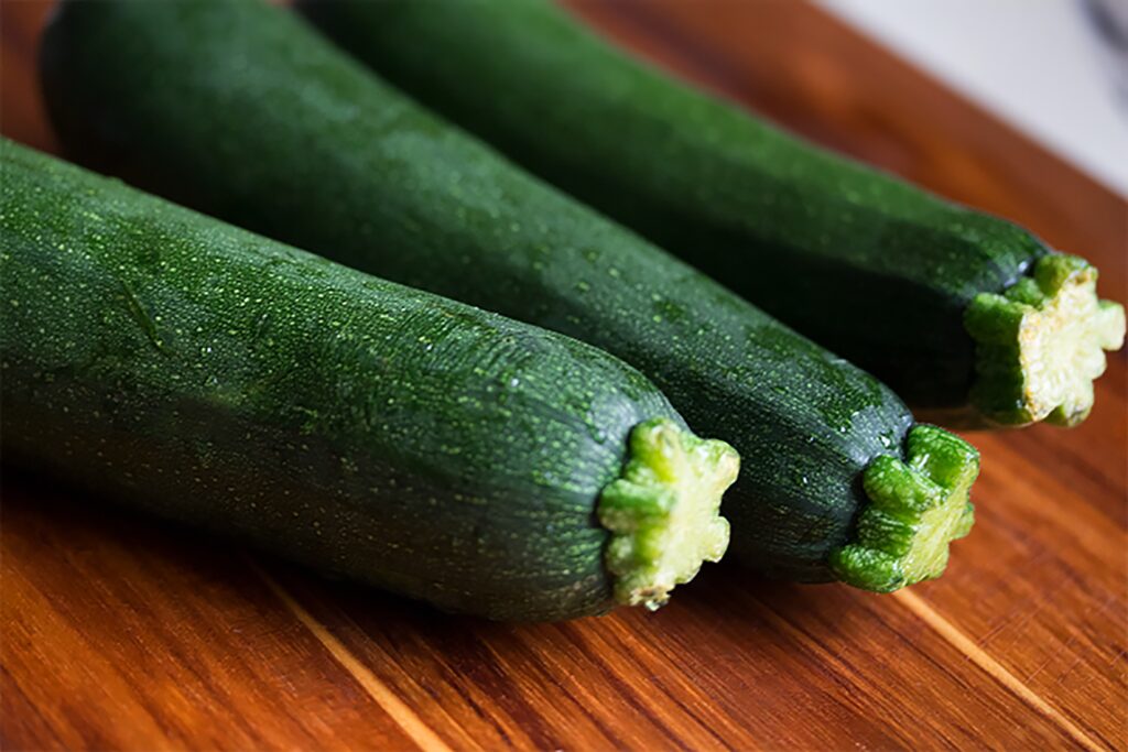 Crisp, refreshing cucumbers captured in a visually appealing, high-resolution photograph, radiating a cool and vibrant essence.